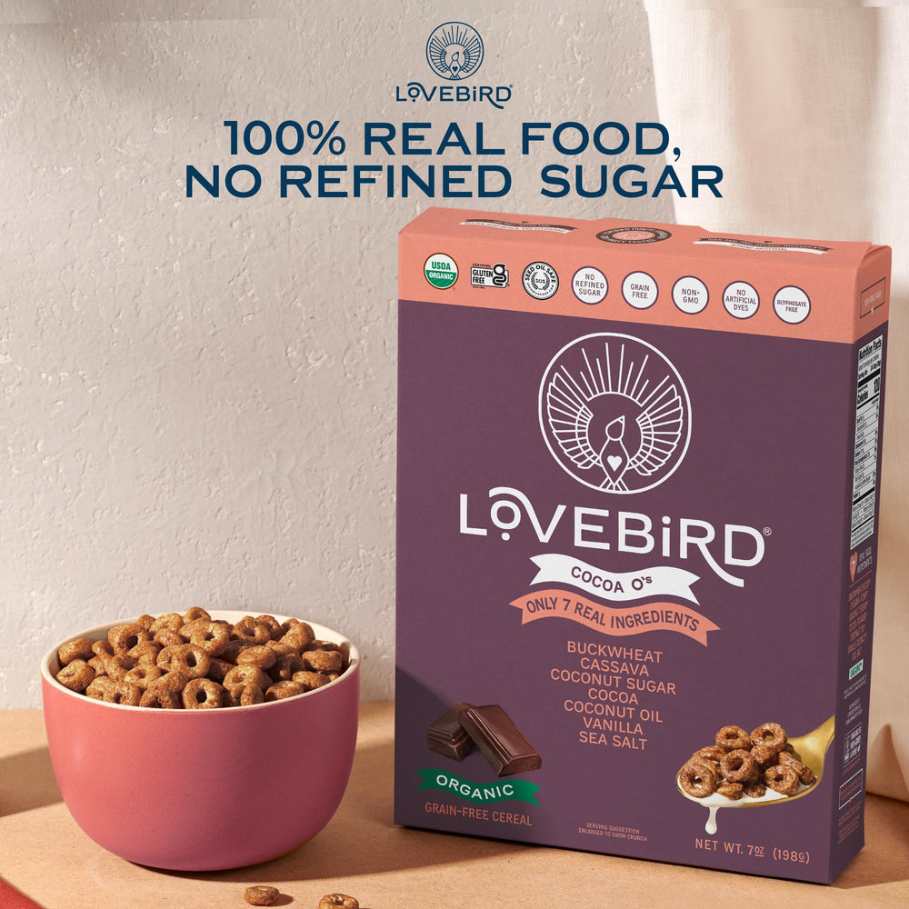 Lovebird cereal on a kitchen counter being poured to show easy use
