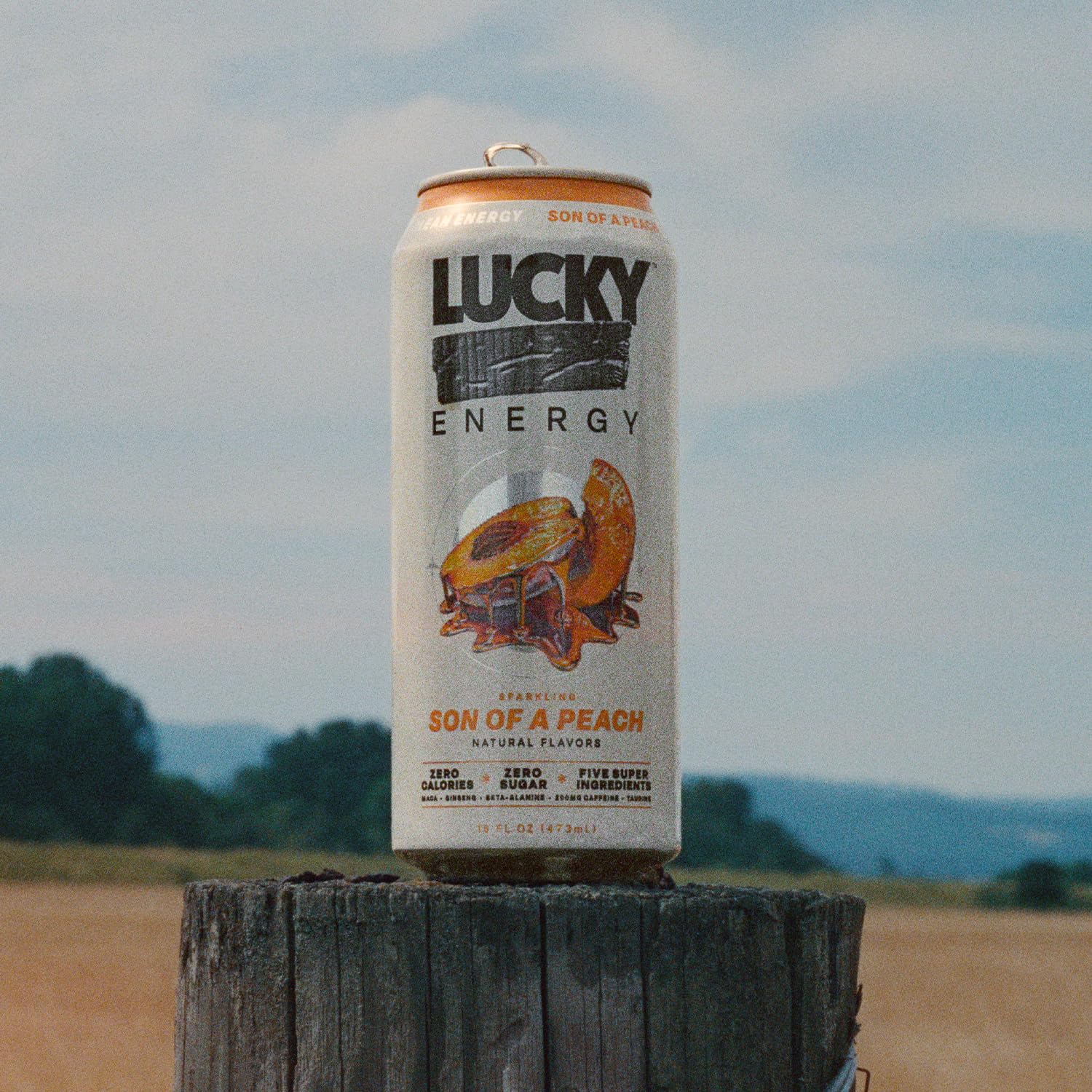 Lucky Energy Son of a Peach on gym bag during workout, boosts focus and stamina