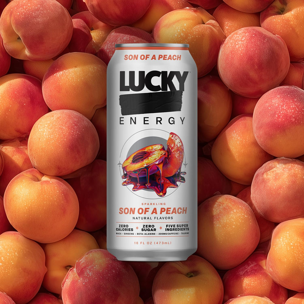 Lucky Energy Son of a Peach poured over ice in glass, refreshing zero-sugar taste