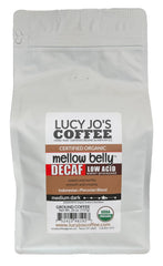 Lucy Jo's Coffee front packaging showing organic low-acid decaf and creamy flavor benefit