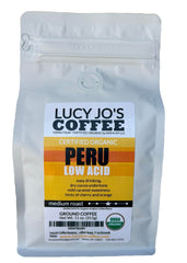 Lucy Jo's Coffee front packaging showing organic Peru medium roast benefits