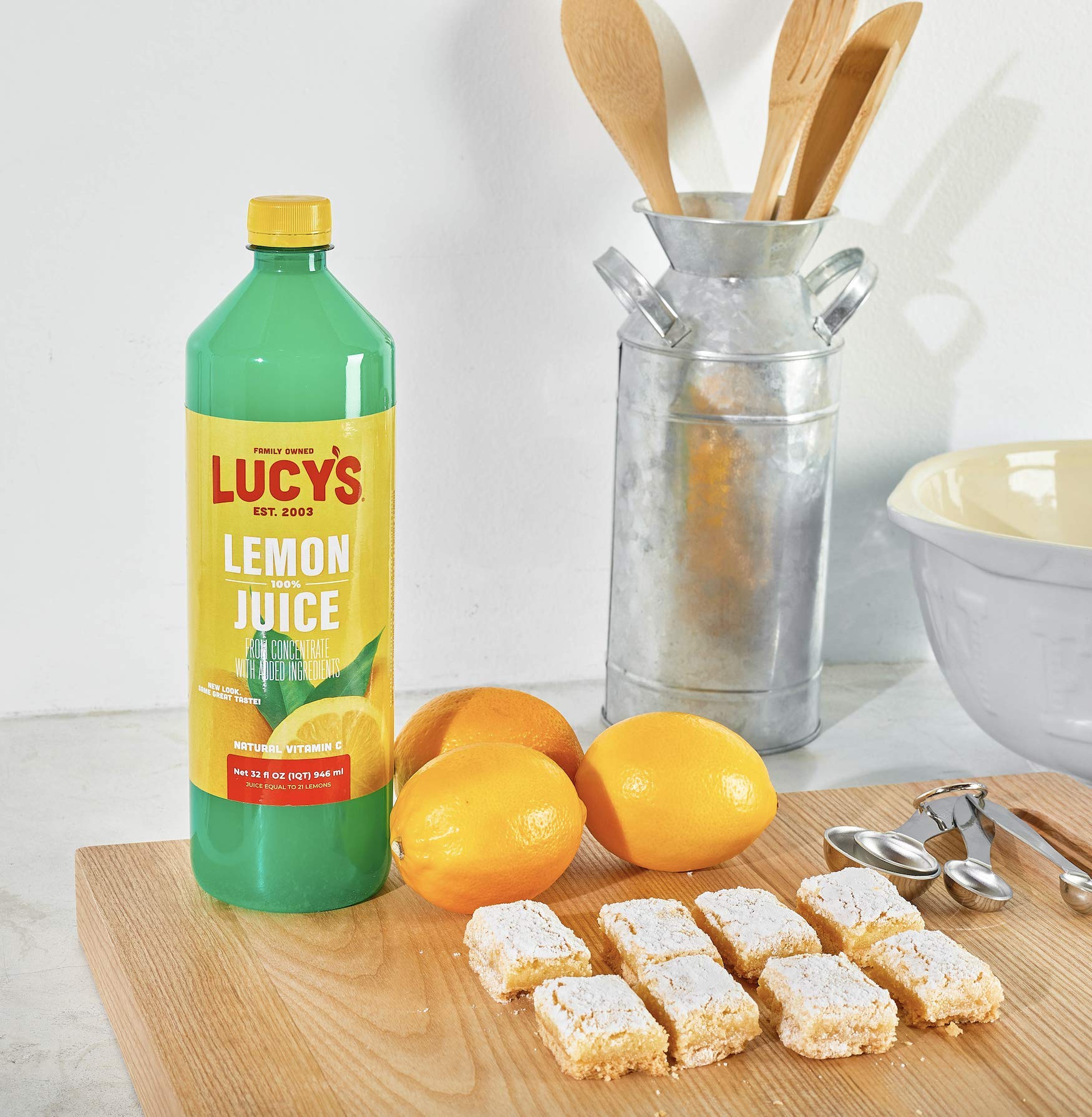 Pouring Lucy's lemon juice into a glass to show beverage use and fast drink preparation benefit