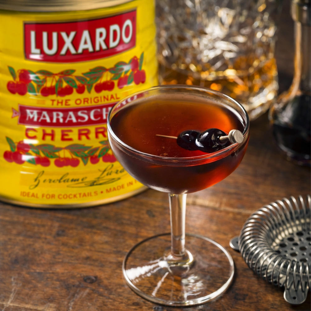 Luxardo cherries used in cocktail demonstrating premium garnish impact
