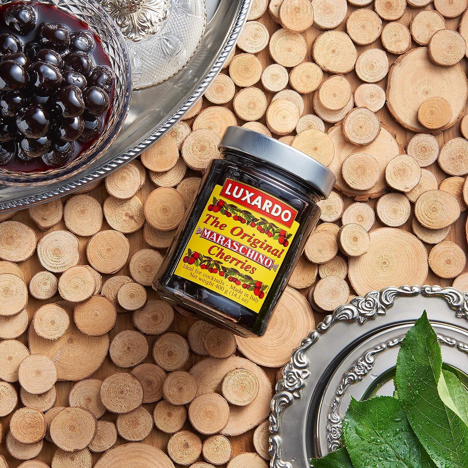 luxardo size comparison hand holding jar to show scale and portion planning benefit
