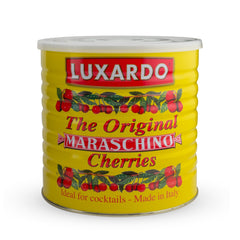 Luxardo syrup pouring from can highlighting glaze and cocktail use