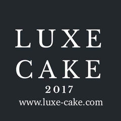 Luxe Cake white powder close-up texture, shows fine grain for even blending
