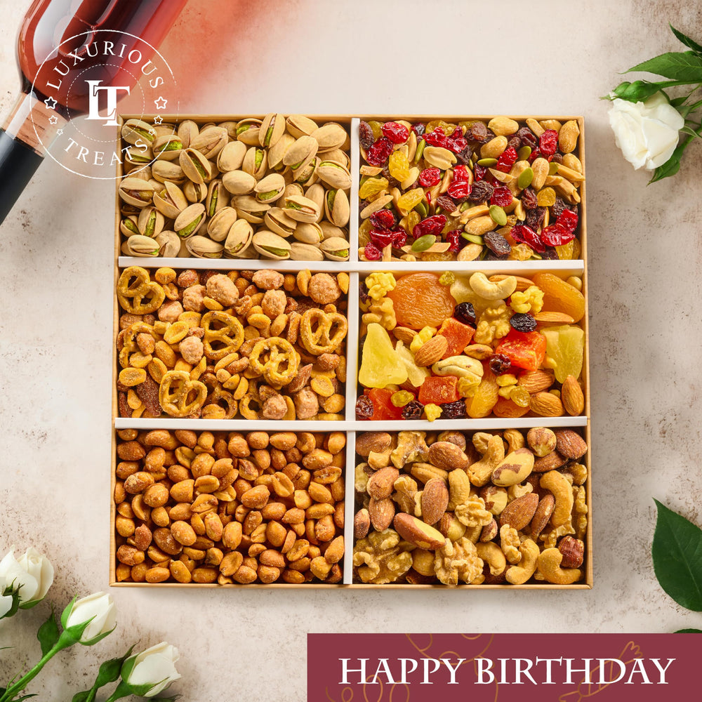 Luxurious Treats open box overhead showing six sealed snack sections and variety
