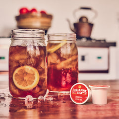 Glass of Luzianne iced tea poured over ice showcasing immediate chilled refreshment