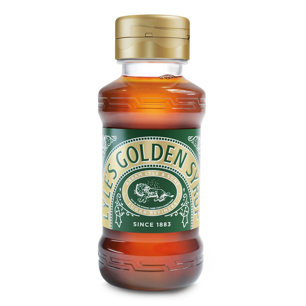 Lyle's Golden Syrup next to measuring spoons showing 11 oz scale and portioning benefit