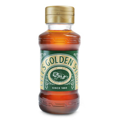 Lyle's Golden Syrup next to measuring spoons showing 11 oz scale and portioning benefit
