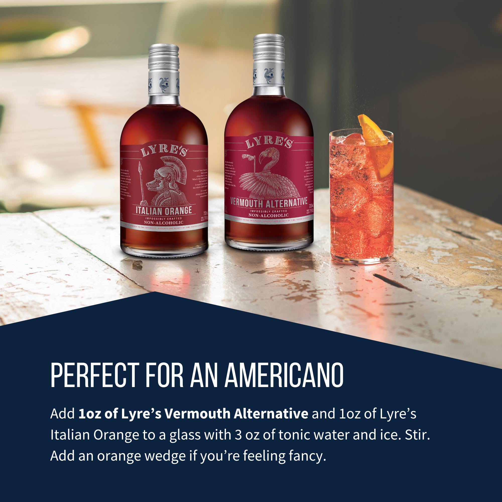 Close detail of citrus garnish beside Lyre's emphasizing blood orange aroma and brightness