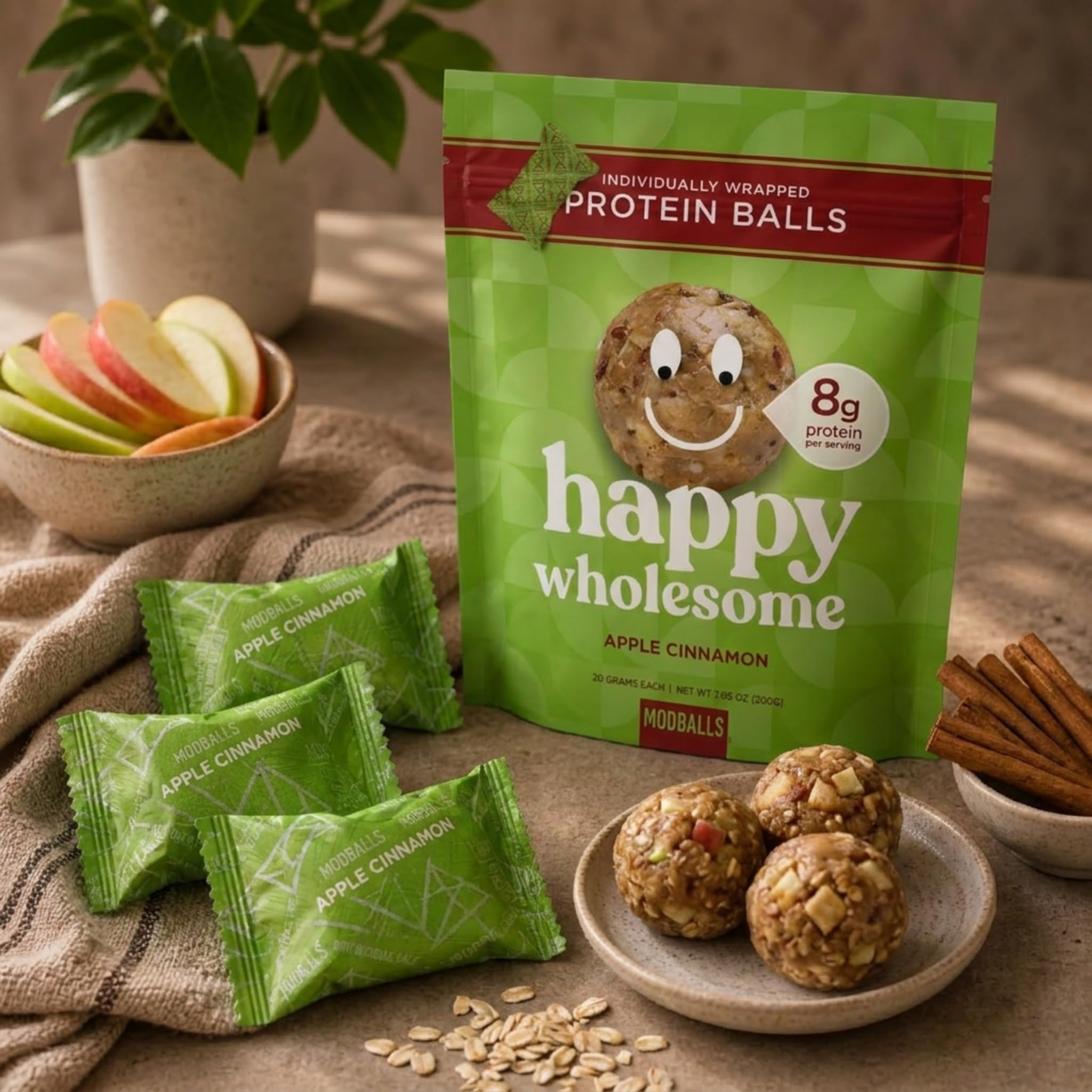 M MODBALLS tucked in backpack illustrating travel-friendly protein option