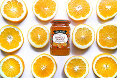Mackays label close-up emphasizing Dundee heritage and Seville orange sourcing benefits