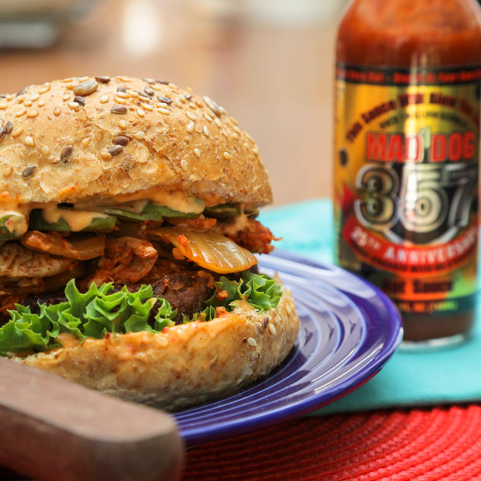 Mad Dog Gear on a backyard grill scene suggesting bold flavor at cookouts