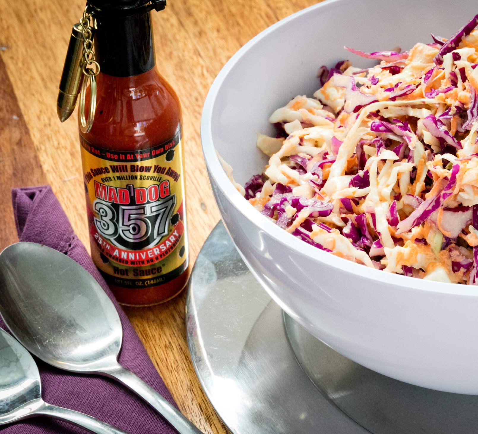 Mad Dog Gear drizzled on chicken wings delivering spicy flavor and crunch