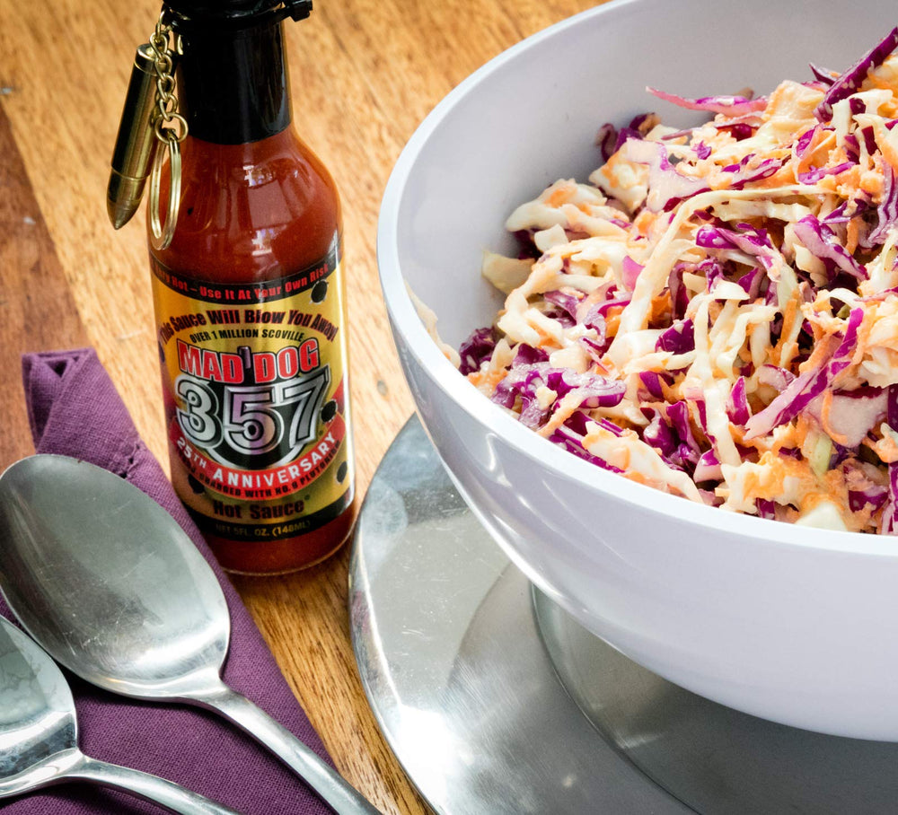 Mad Dog Gear drizzled on chicken wings delivering spicy flavor and crunch