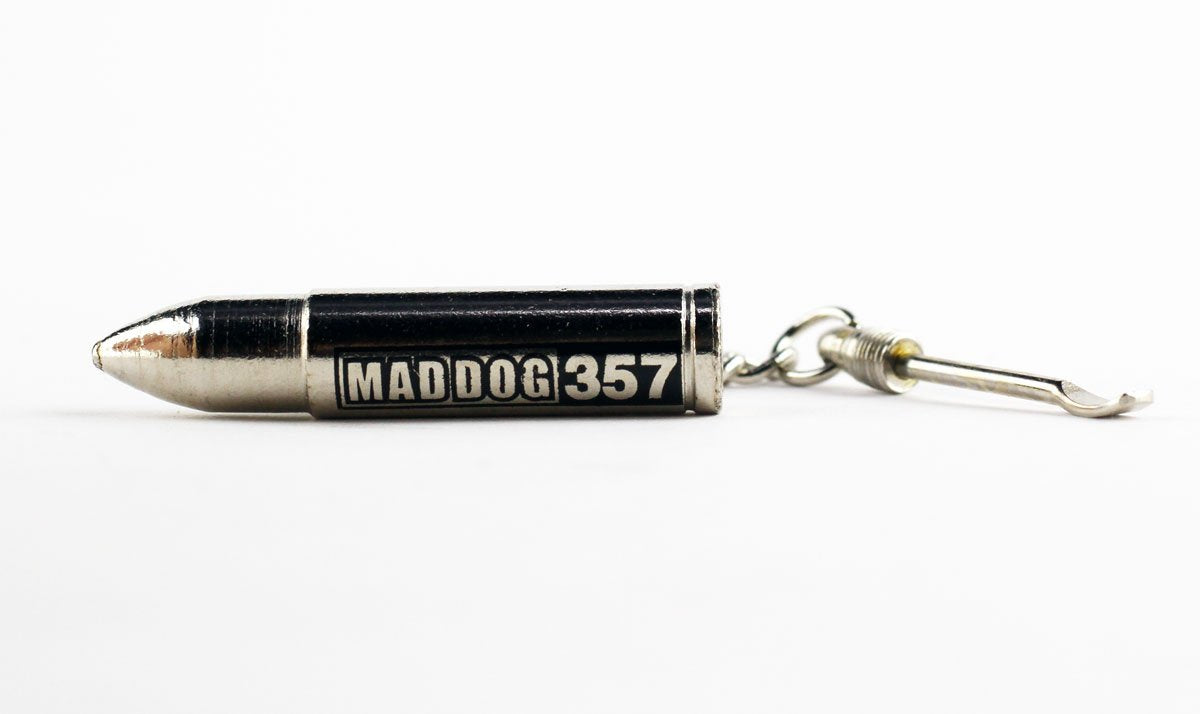 Mad Dog 357 Silver bullet keychain close-up highlighting portability and secure cap