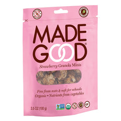 MadeGood open pouch showing crunchy granola clusters with strawberry pieces