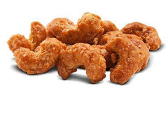 The Magic Bavarian Nuts cinnamon-coated cashew close-up showing crunchy sugar glaze aroma