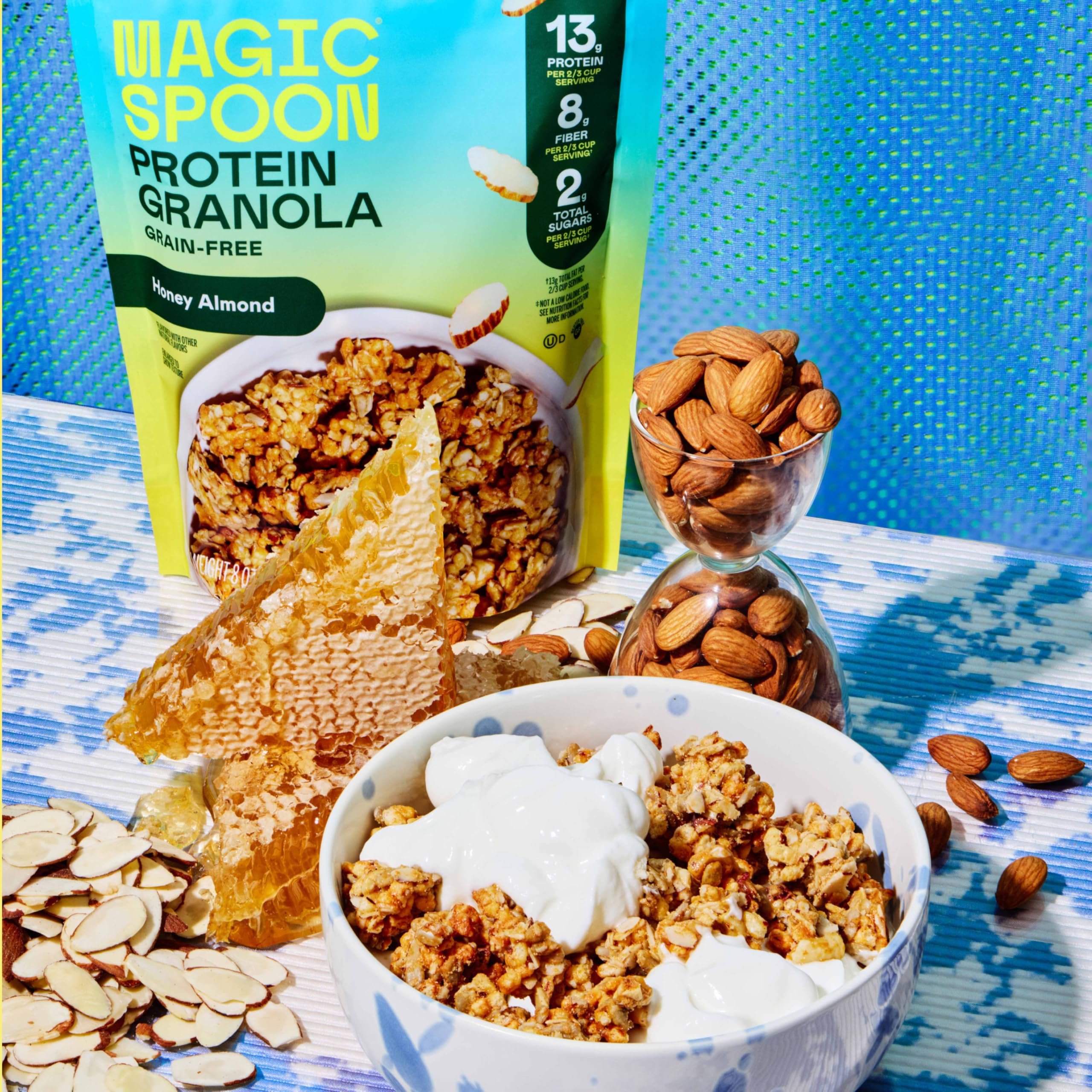 Magic Spoon bag in hand for scale illustrating portable size and on‑the‑go convenience