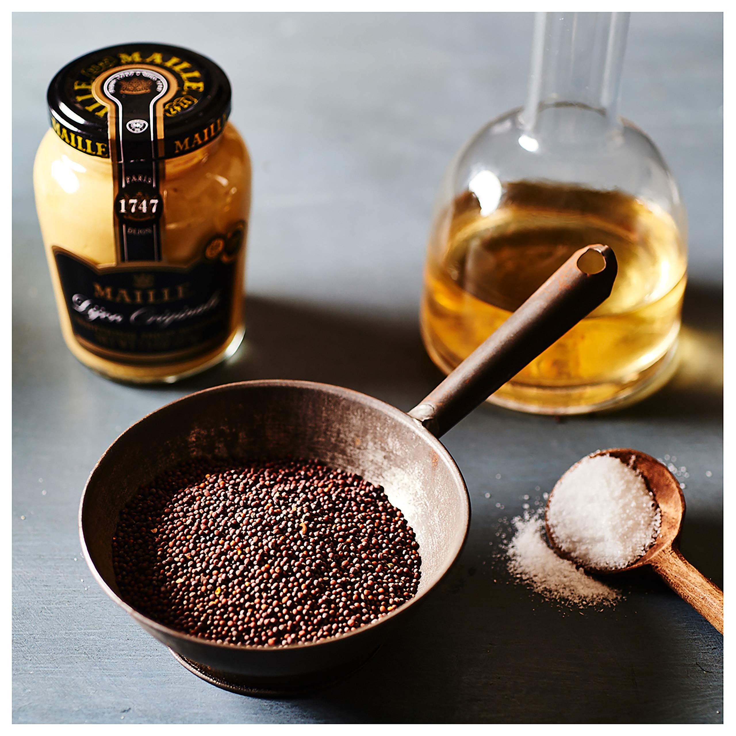 Maille Old Style close-up of whole seeds and grainy texture adding mouthfeel