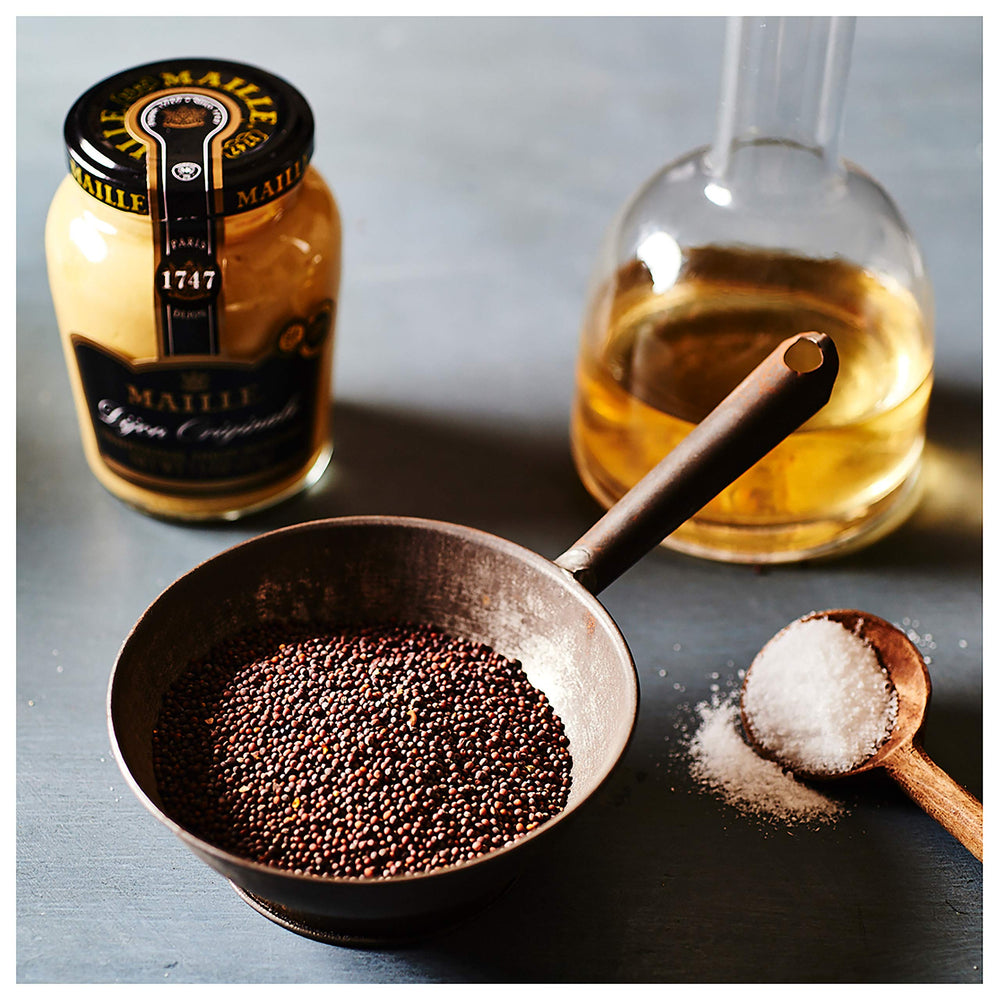 Maille Old Style close-up of whole seeds and grainy texture adding mouthfeel