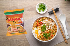 MAMA seasoning sachets spread out showing full-flavor components