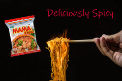 MAMA spice packet close-up with seasoning oils, highlighting bold pork flavor and aroma
