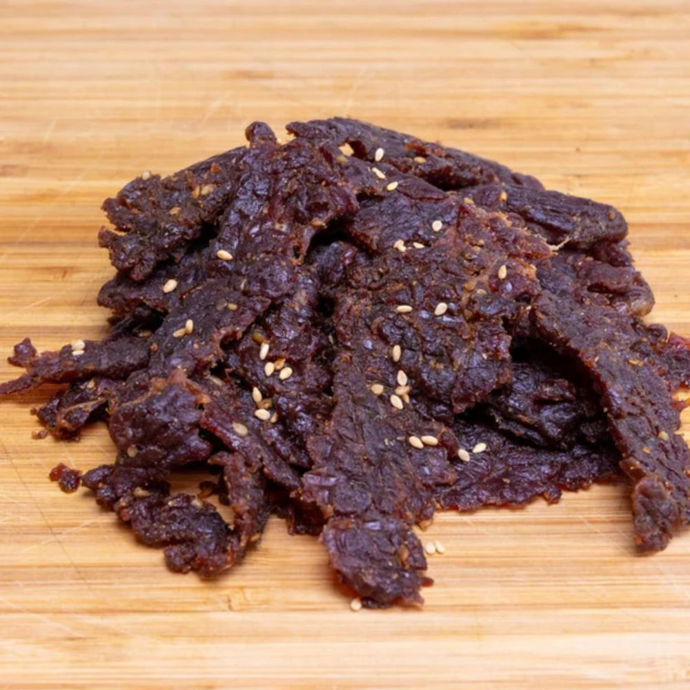 Man Candy bag inside hiking backpack demonstrating on-the-go snack convenience