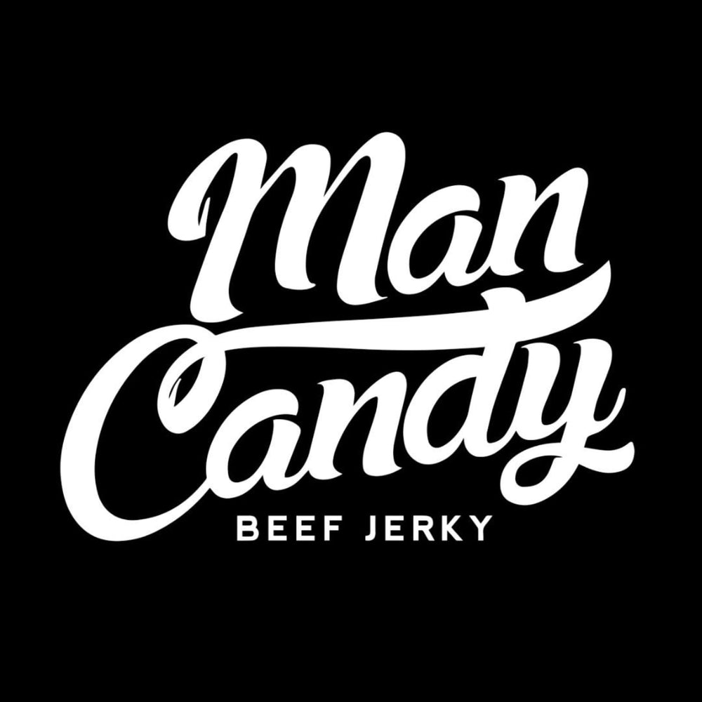 Man Candy by a campfire portraying lifestyle enjoyment and outdoor protein snack