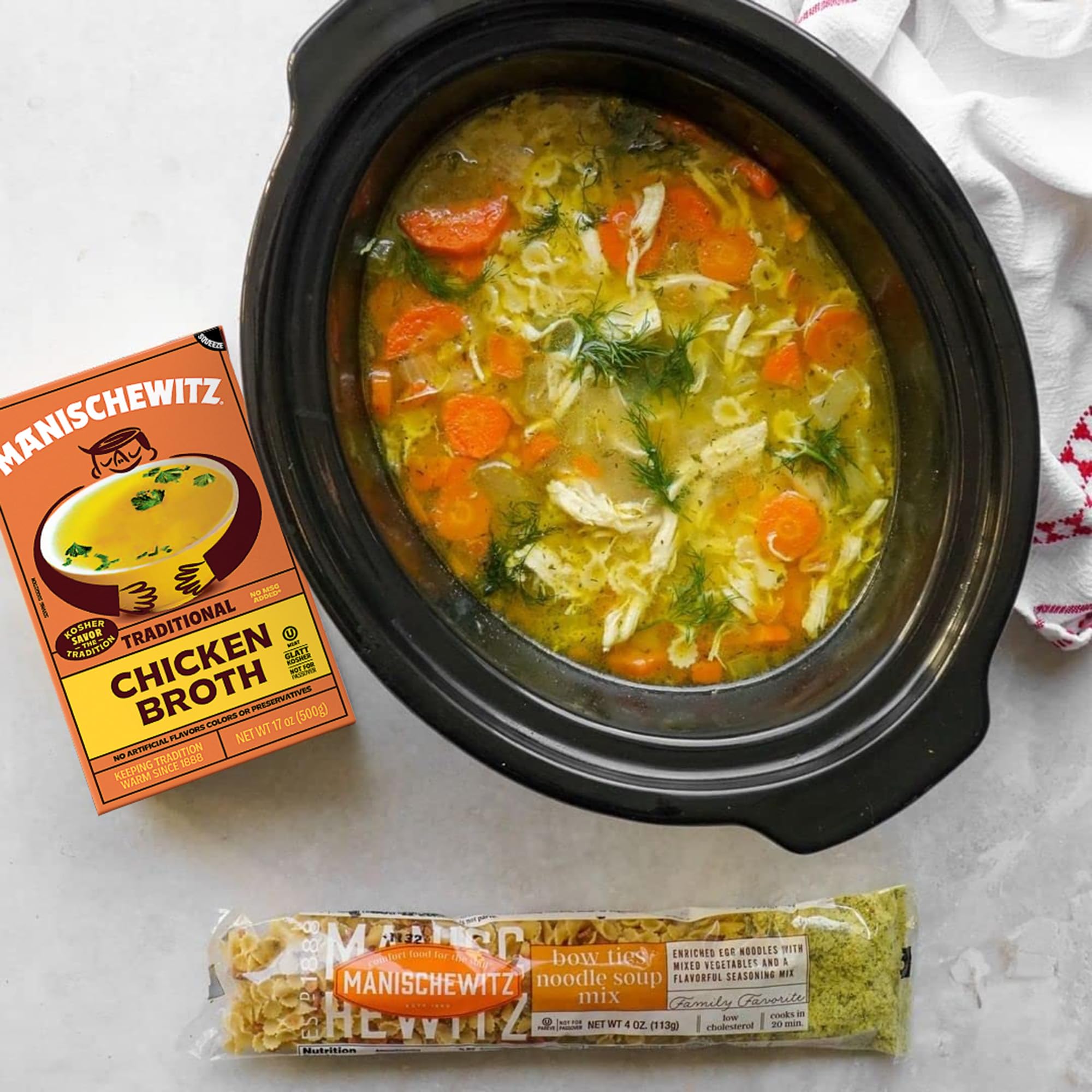 Manischewitz rich golden broth in bowl showing texture and deep savory color for recipes