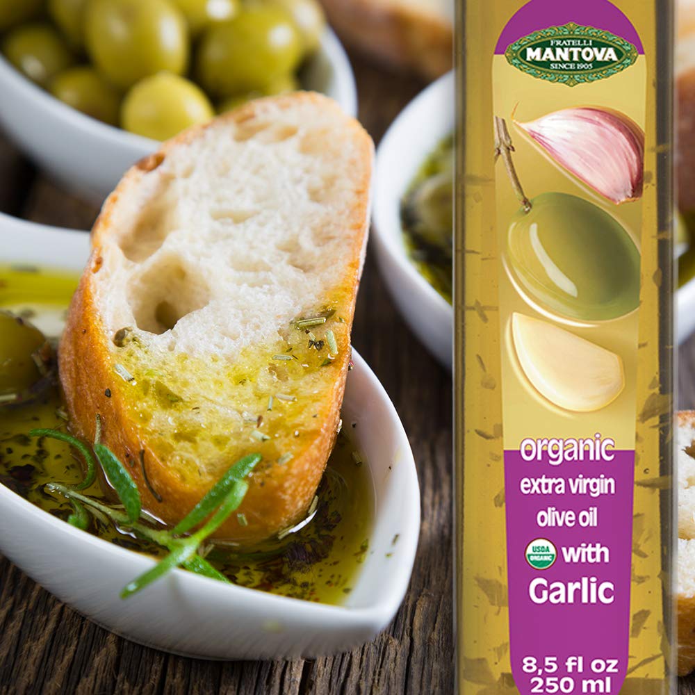 Mantova garlic oil pouring close-up demonstrating smooth drizzle control