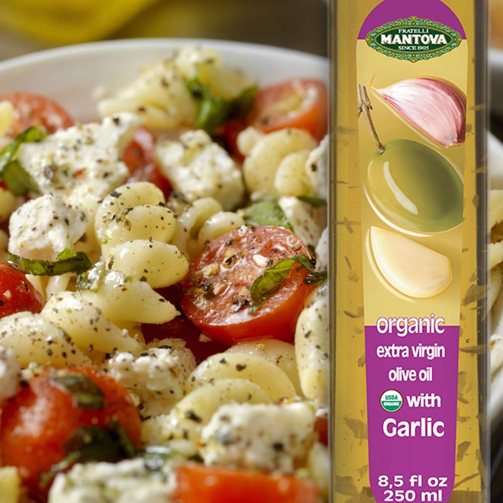 Mantova bottle on table with bread and salad showing flavorful serving idea