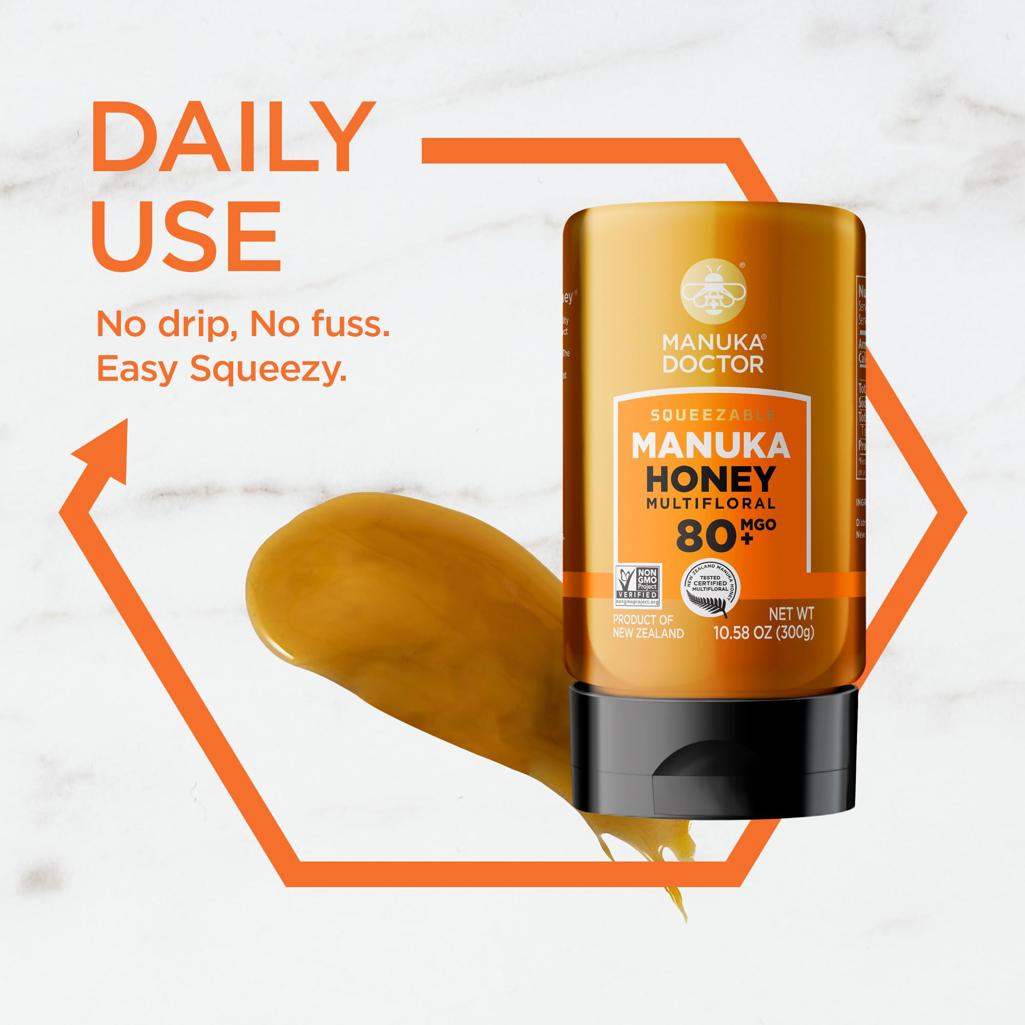 Manuka Doctor honey on spoon highlighting thick, creamy texture