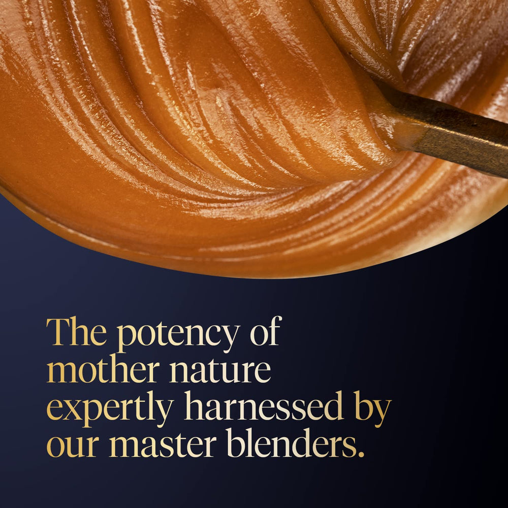 Spoon of Manuka Health honey drizzling onto toast showing natural sweetening use