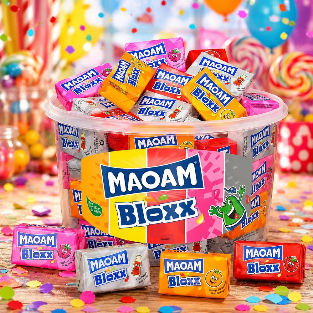 Maoam cubes in hand demonstrating size and easy portioning