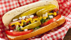 Marconi hot giardiniera spooned onto sandwich adding spicy crunch
