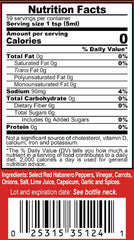 Marie Sharp's label close-up highlighting ingredients and extreme-heat warning for quick identification