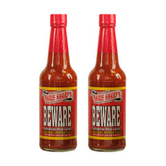 Marie Sharp's front bottle view showing bold label and intense hot sauce impact
