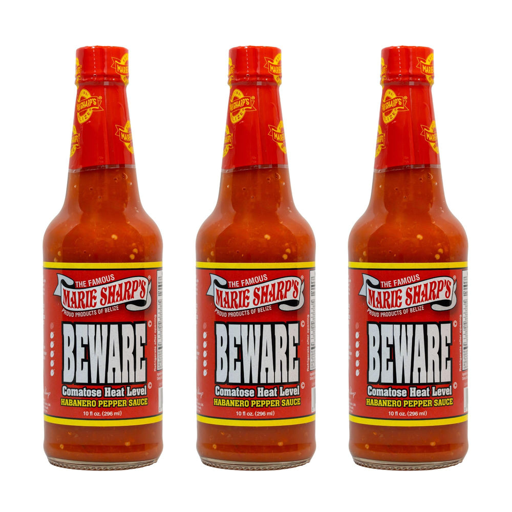 Marie Sharp's BEWARE front packaging showing bold red habanero sauce and brand badge