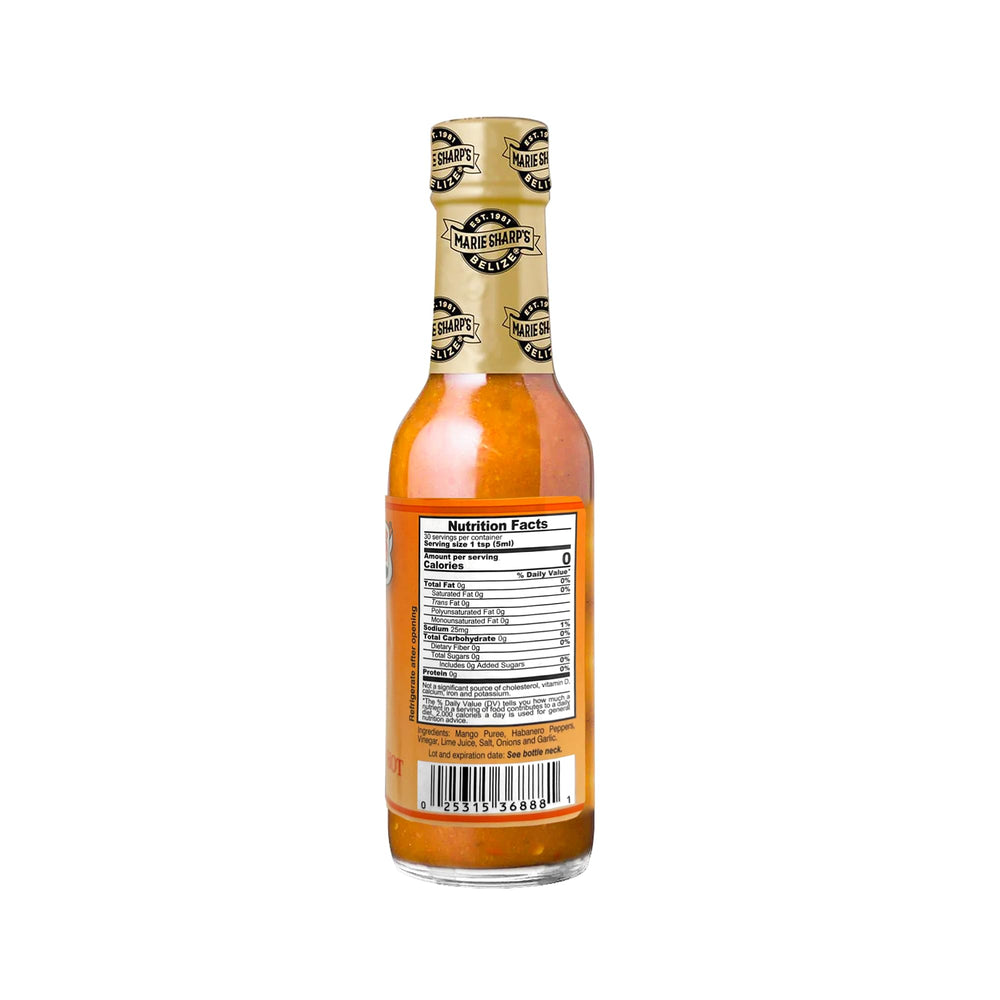 Marie Sharp's fresh mango and habanero peppers staged to show authentic ingredients benefit