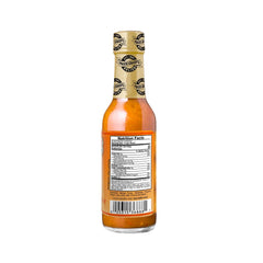 Marie Sharp's fresh mango and habanero peppers staged to show authentic ingredients benefit