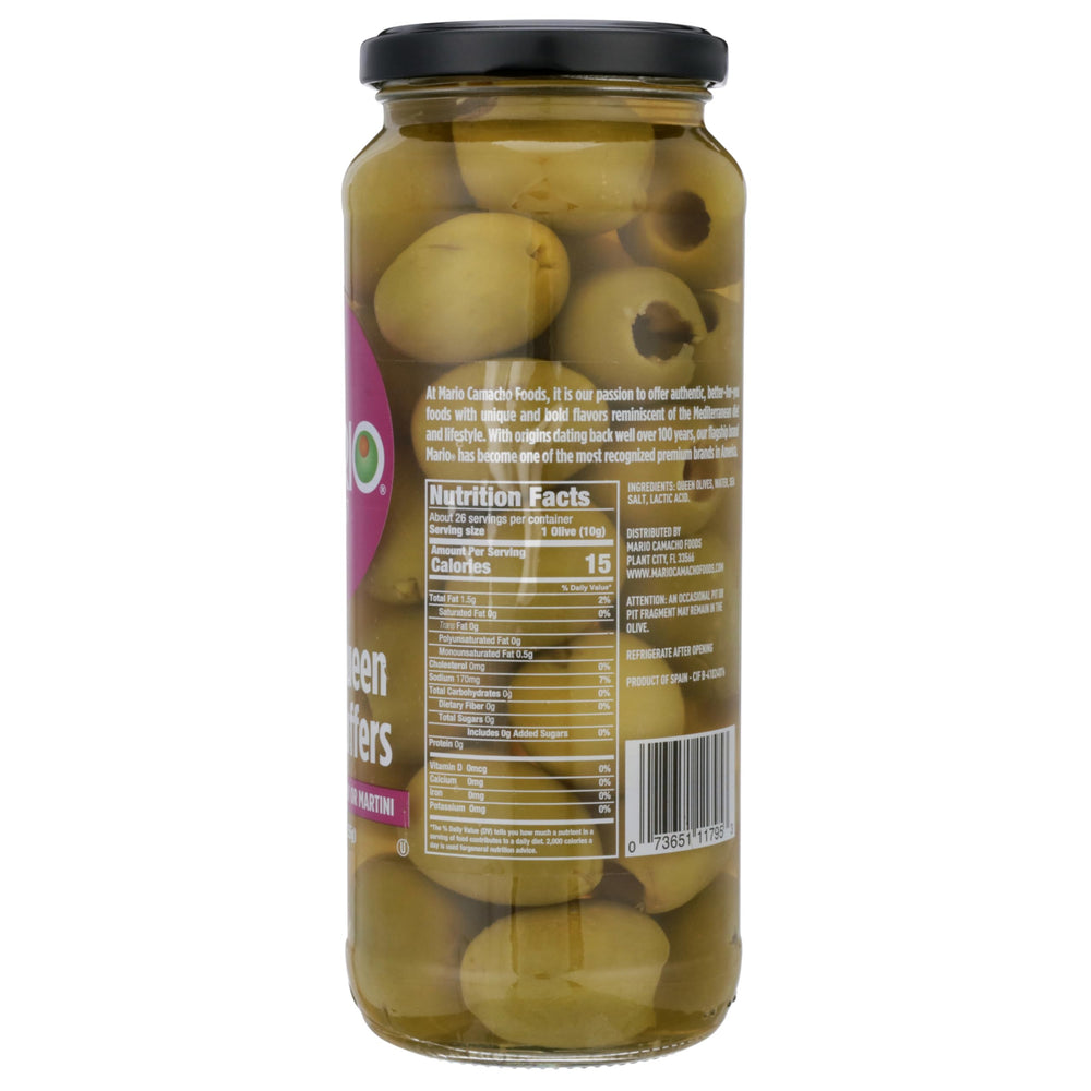 Mario Camacho Foods olive next to spoon showing large size and convenience