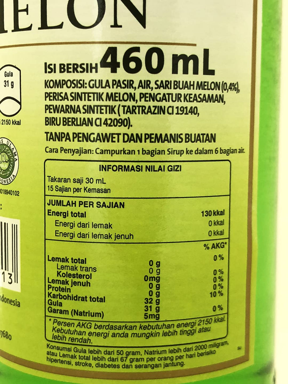 Marjan syrup pouring into glass for drink preparation, quick flavoring benefit