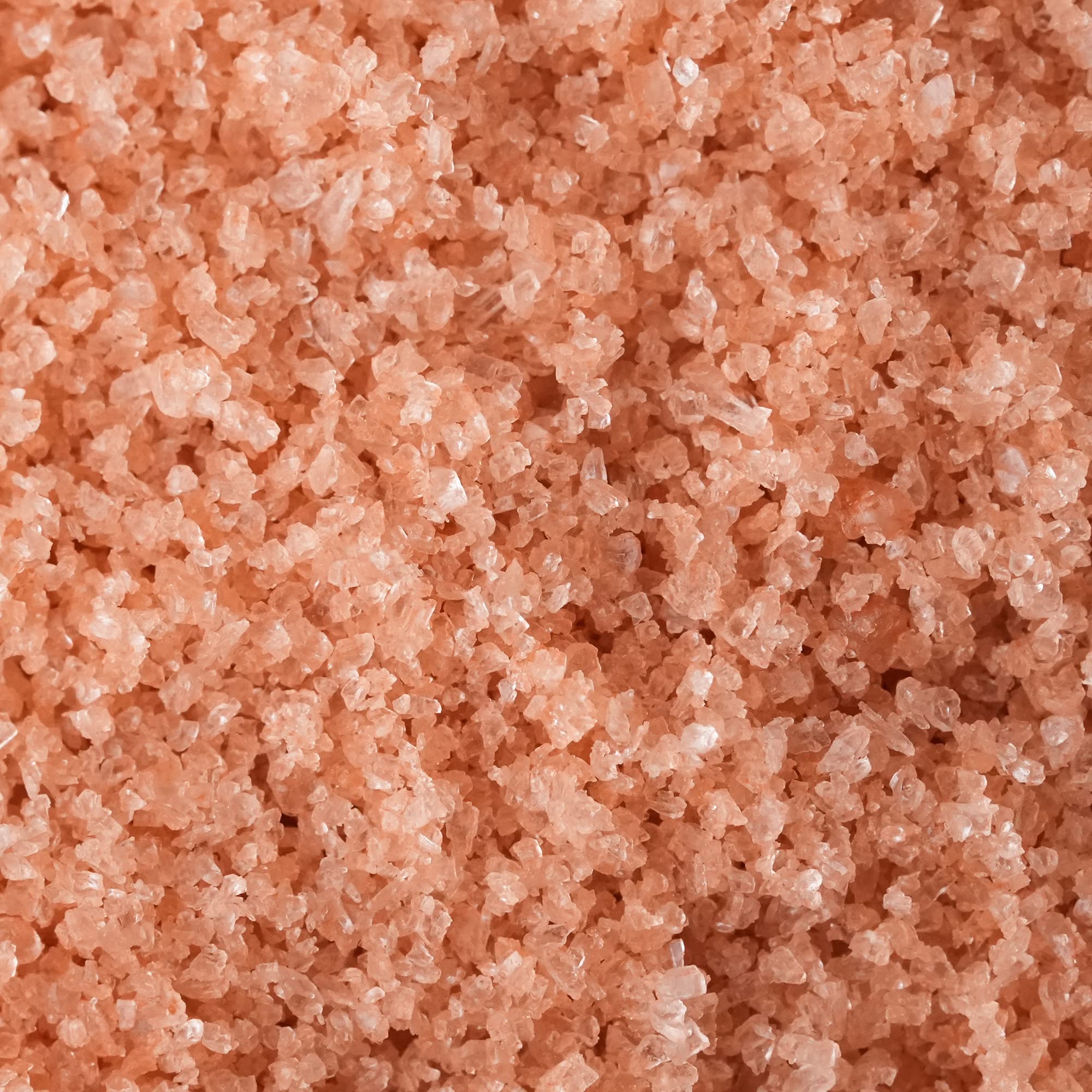 MARKY'S close-up of fine pink crystals highlighting delicate texture and quick dissolve benefit