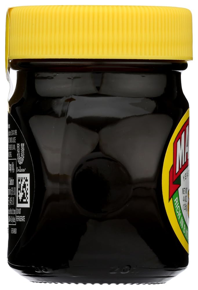 Marmite jar open close-up showing thick dark texture and versatile use