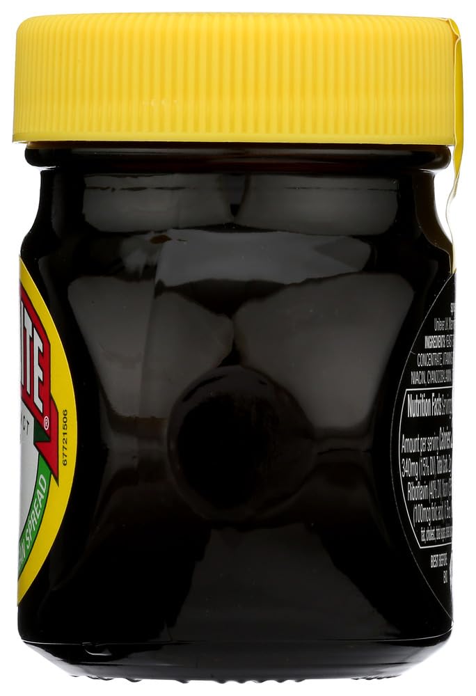 Marmite jar beside teaspoon showing serving size, Marmite helps portion control