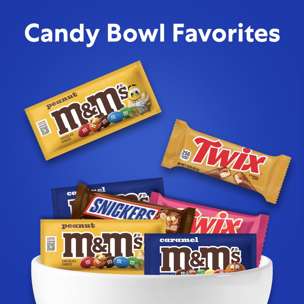 Full-size Mars bar in hand showing scale and generous serving size