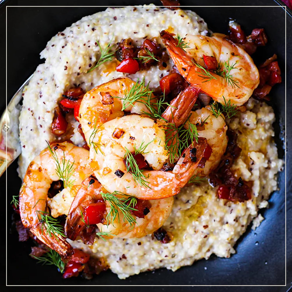 Marsh Hen Mill grits served with shrimp and garnish showing versatile savory pairing