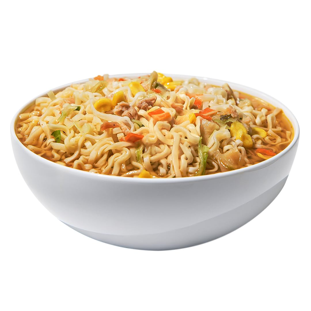 Maruchan bowl next to smartphone for scale showing portable single-serve convenience